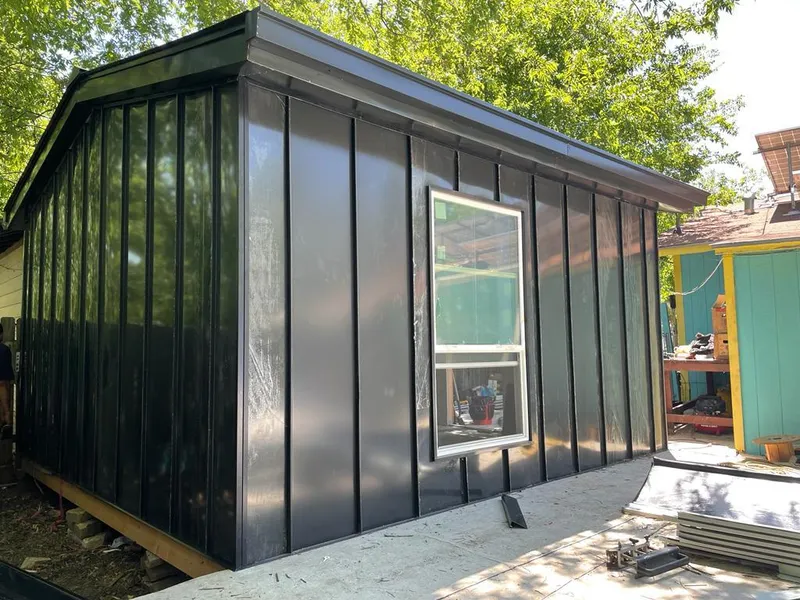 Black standing seam metal wall panels for Metal Roof Installation in Maryville